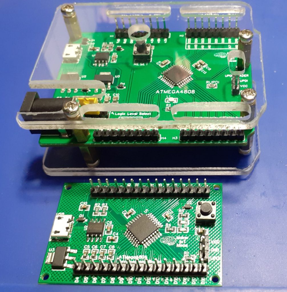 ATMEGA4808 Module and Development Card side by side